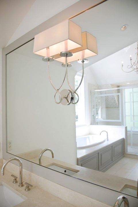 Frame bathroom mirror with mounted light